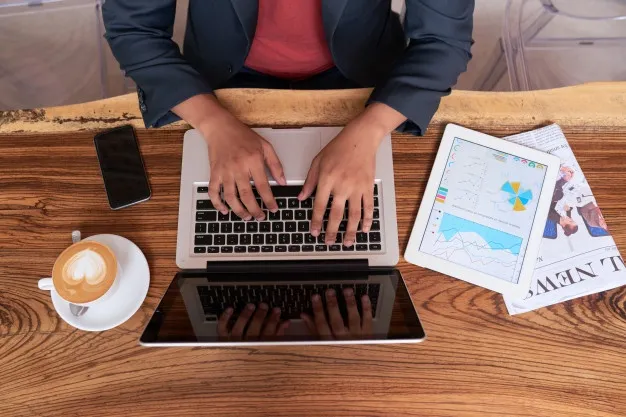 hands unrecognizable man sitting wooden table cafe working laptop 1098 20195 - Blog